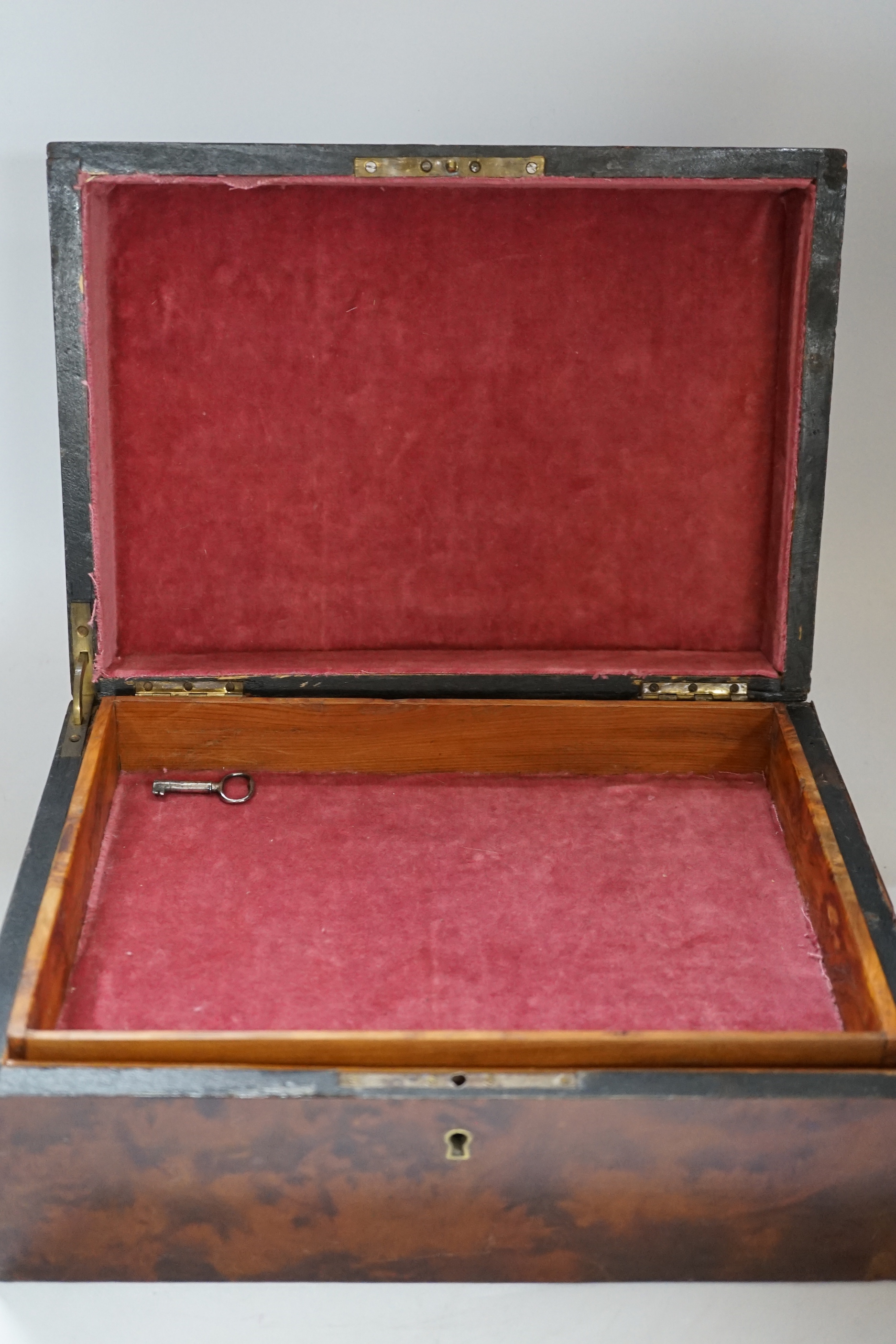 A Late 19th century burr yew and brass inlaid jewellery box, with lift out compartment and key, 28cm wide